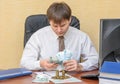 The man in the office, said the money lying on the writ of execution Royalty Free Stock Photo