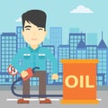 Man with oil barrel and gas pump nozzle. Royalty Free Stock Photo