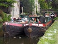 a man on the old barges at the narrow boats club gathering held on the may bank holiday on the rochdale canal at hebden bridge in Royalty Free Stock Photo