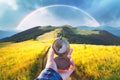 Man with old metal compass in hand on mountains road Royalty Free Stock Photo