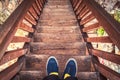 Man on old wooden stairs Royalty Free Stock Photo