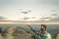 Man with open arms in the mountains. Concept of adventure and freedom Royalty Free Stock Photo