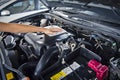 Man open the car hood and polishing car with microfiber cloth Royalty Free Stock Photo