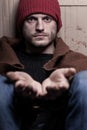 Man with open hands begging for help Royalty Free Stock Photo