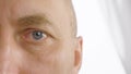 Man with opened eyes blinking close up. Vision, eyesight, ophthalmology