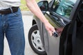 Man opening car door Royalty Free Stock Photo