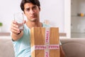The man opening fragile parcel ordered from internet