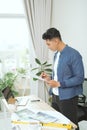 Man opening fragile parcel ordered from internet