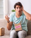 Man opening fragile parcel ordered from internet