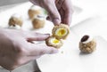 Gourmet organic scotch quail eggs starter snack on table Royalty Free Stock Photo