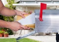 Man Taking The Letters From Mailbox Royalty Free Stock Photo