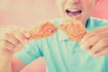 A man with opening mouth about to eat deep fried chicken legs Royalty Free Stock Photo