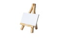 Mock Up Empty blank canvas on wooden easel isolated on white background