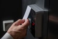 A man opens the door with a card. Modern electronic lock. Keyless Entry