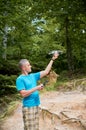 Man operating drone using remote controller. Royalty Free Stock Photo