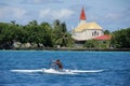 Man in Outrigger Canoe Royalty Free Stock Photo