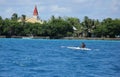 Man in Outrigger Canoe