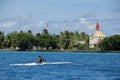 Man in Outrigger Canoe