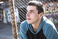 Man outside close to a fence without feeling Royalty Free Stock Photo