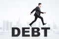 Man overcome debt problems concept at city background Royalty Free Stock Photo