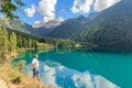 Man overlooking the alpine lake lago Anterselva Royalty Free Stock Photo