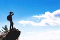 Man overlooking the mountains belown Royalty Free Stock Photo