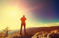 Man overlooking the mountains belown Royalty Free Stock Photo