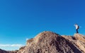 Man overlooking the mountains belown Royalty Free Stock Photo