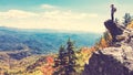 Man overlooking the mountains belown Royalty Free Stock Photo