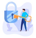 Man with oversized key approaching large lock symbolizes security access. Securing privacy concept, personal data