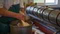 Man packing cheese ready for processing Royalty Free Stock Photo