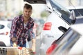 Man Packing Groceries into Car Royalty Free Stock Photo