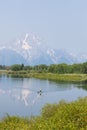 Man on a Paddle Board at Grand Teton National Park Royalty Free Stock Photo