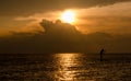 Man on paddle board and Michigan sunset Royalty Free Stock Photo
