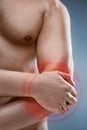 Man With Pain In Elbow. Pain relief concept Royalty Free Stock Photo