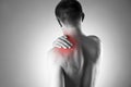 Man with pain in shoulder. Pain in the human body Royalty Free Stock Photo