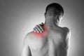 Man with pain in shoulder. Pain in the human body Royalty Free Stock Photo