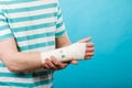 Man with painful bandaged hand. Royalty Free Stock Photo