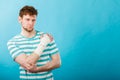 Man with painful bandaged hand. Royalty Free Stock Photo