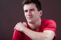 Man with a painful shoulder Royalty Free Stock Photo