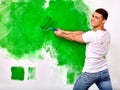 Man paint wall at home Royalty Free Stock Photo