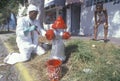 Man painting a fire hydrant, South Beach, Florida