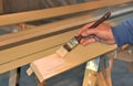 Man painting trim boards Royalty Free Stock Photo