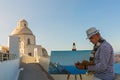 Man paints sea and Church Royalty Free Stock Photo