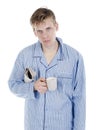 Man in pajamas with newspaper Royalty Free Stock Photo