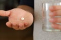 Man palm showing a pill