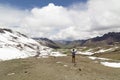 Man with panoramic view. Hiking scene in Vinicunca, Cusco region, Peru. Montana of Seven Colors, Rainbow Mountain