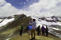 Man with panoramic view. Hiking scene in Vinicunca, Cusco region, Peru. Montana of Seven Colors, Rainbow Mountain