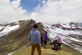 Man with panoramic view. Hiking scene in Vinicunca, Cusco region, Peru. Montana of Seven Colors, Rainbow Mountain Royalty Free Stock Photo