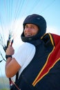 Man, parachute or launch in nature for sport, happy or exercise for healthy adventure for extreme fitness. Person Royalty Free Stock Photo